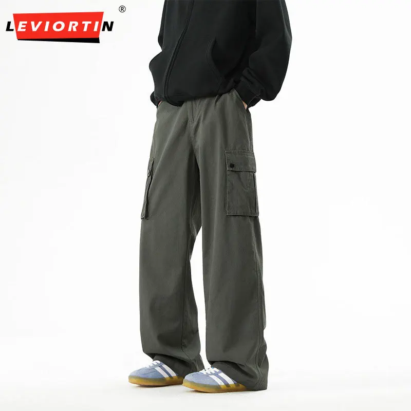 

2025: Мужские весенне-осенние элитные модные, универсальные, свободные и простые, с несколькими карманами, повседневные джинсовые брюки прямого кроя.