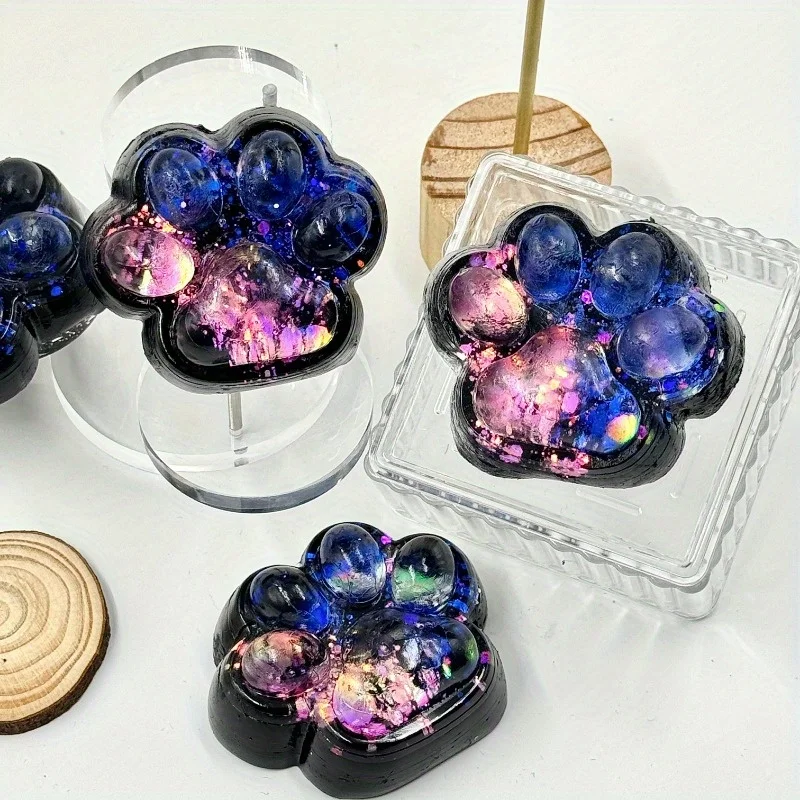 1pc Starry Night Glow Squishy Knijpspeeltje - Zwart Gradiënt Blauw Kat Poot Relax Zacht Speelspeeltje voor 3+ jaar, Perfect 3-jarige Gif