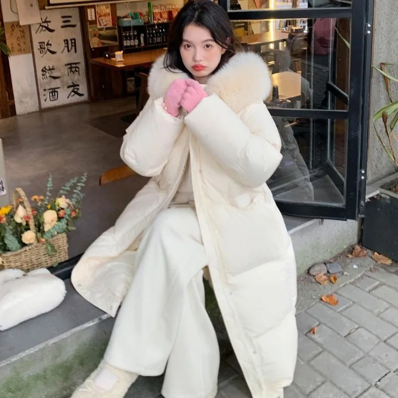 De nieuwe trendy katoenen gewatteerde jas in Koreaanse stijl, lange losse jas, katoenen gewatteerde jas, klassieke unieke winter-woon-werkverkeer