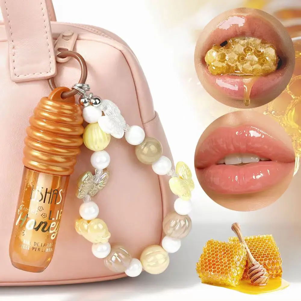 USHAS Aceite labial de miel tipo espejo, diseño de encanto portátil, hidrata y cuidado de los labios, reduce las líneas de los labios.