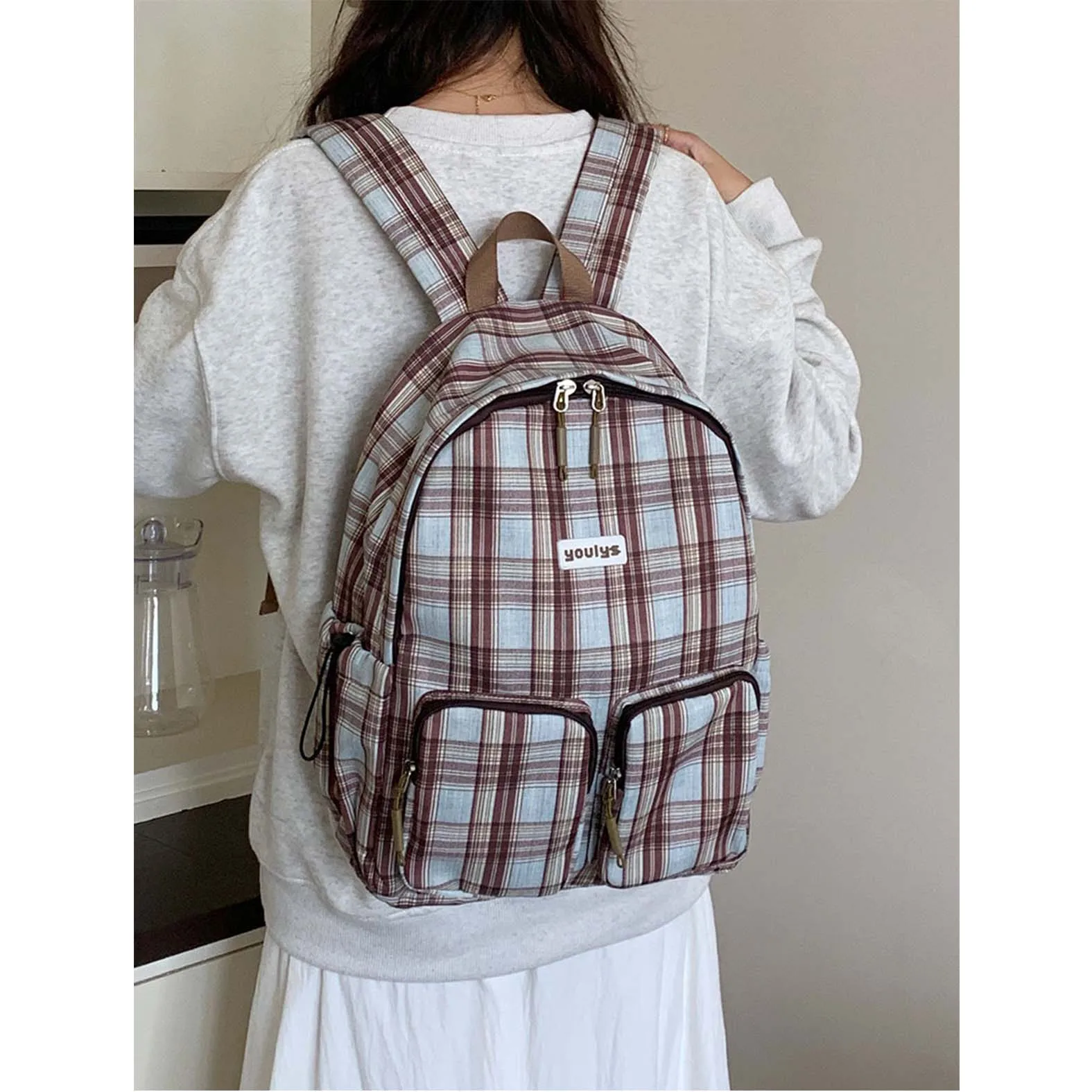 

Female college student 2025 new large capacity lightweight backpack with high aesthetic value and color blocking travel backpack