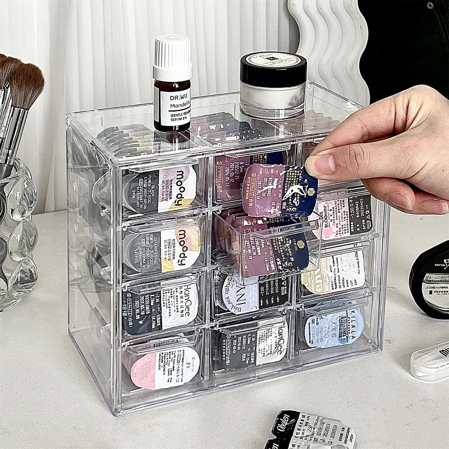 The 12-frame contact lens case is a large-capacity transparent multi-purpose object case