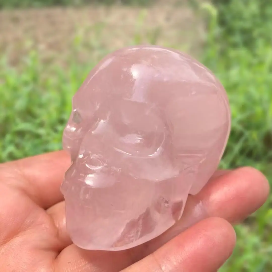 A Single Rose Quartz Skull Carving, Perfect for Decorating Your Home or Office