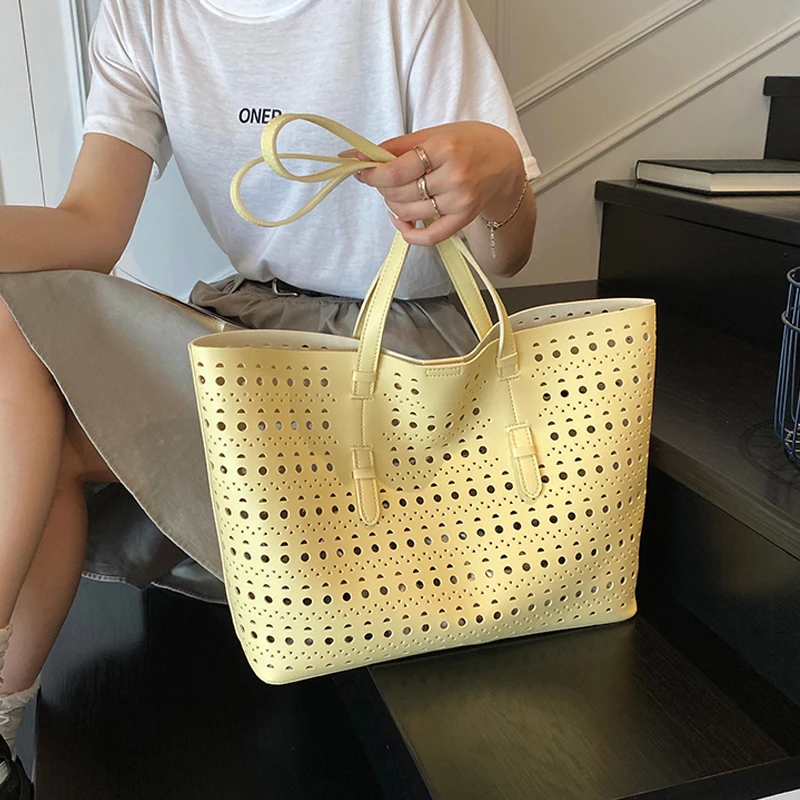 

Fashion Hollow Out Tote Bags for Women Large Capacity Casual Commuting One Shoulder Bags 2025 New Solid Color Versatile Handbags