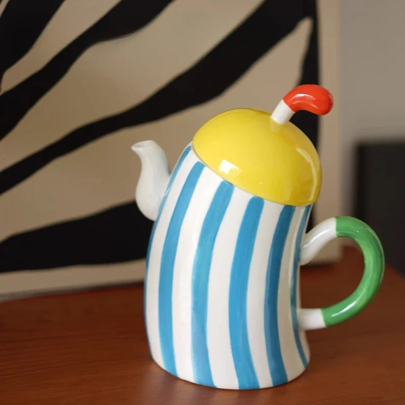 Creative cross waist shaped teapot, clown shaped ceramic kettle, household heat-resistant kettle, desktop decorative ornament