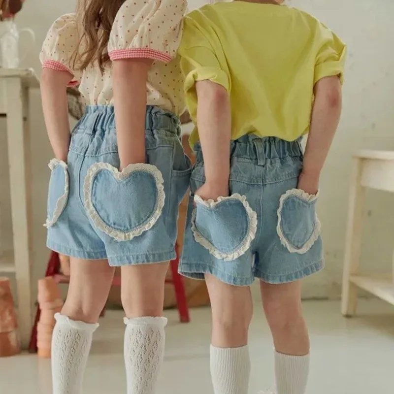 

2026 Summer New Girls Denim Shorts Baby Girl Cute Heart Pocket Jeans Solid Children Causal Shorts Fashion Kids Clothes