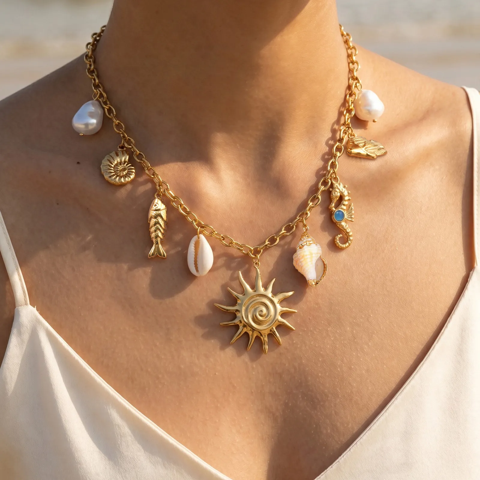 

Ocean Charm Necklace Sun Seahorse Shell Pearl Fish Pendant Statement Stainless Steel Golden PVD Plated Jewelry