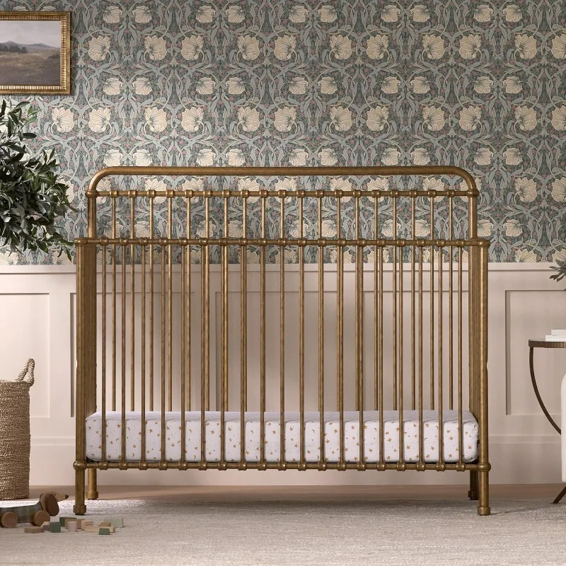 4-in-1 Convertible Metal Crib in Vintage Gold, Four Adjustable Mattress Positions That Can Be Lowered As Your Baby Grows.