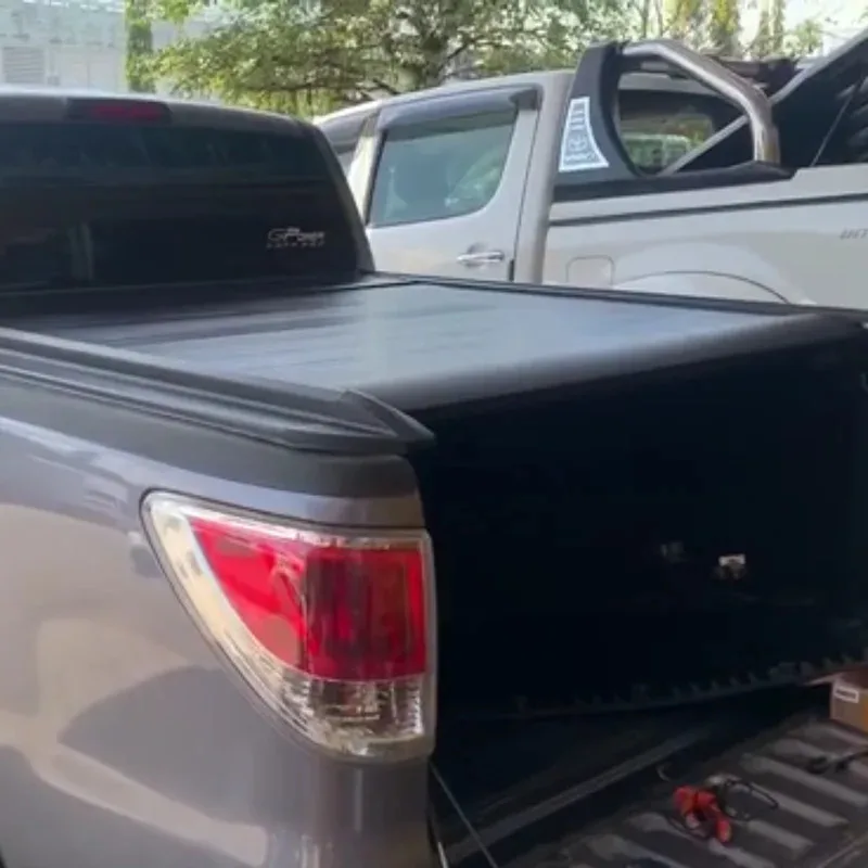 

Лидер продаж на заводе ST, высококачественный чехол для кровати Tonneau, втягивающий звукосниматель, жесткий электрический чехол для задней крышки bt-50 GT 2017