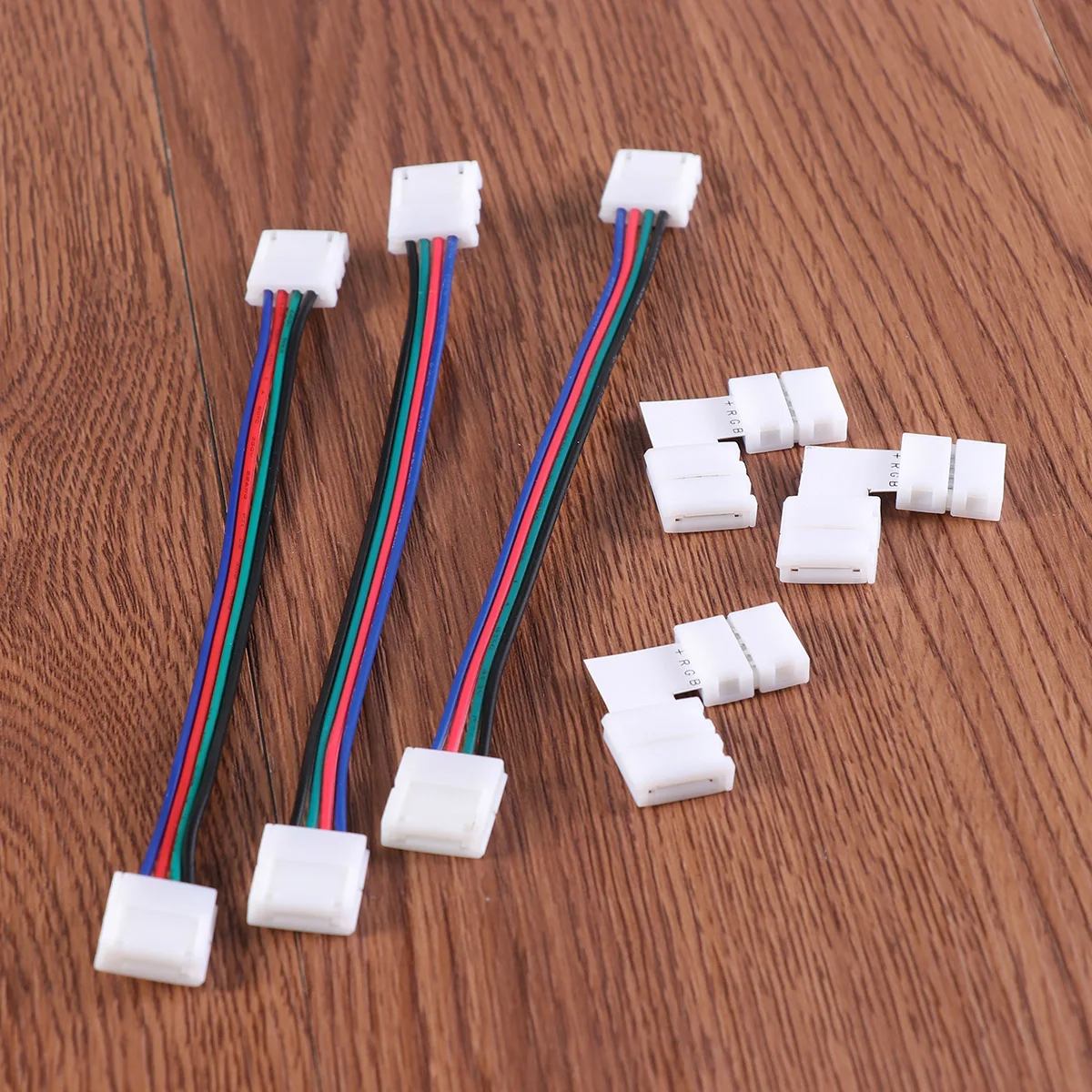 

LED Light Strip Connector Solderless RGB Power Adaptor Flexible Wire LED Strip Jumper 4 Pin Extension Cable