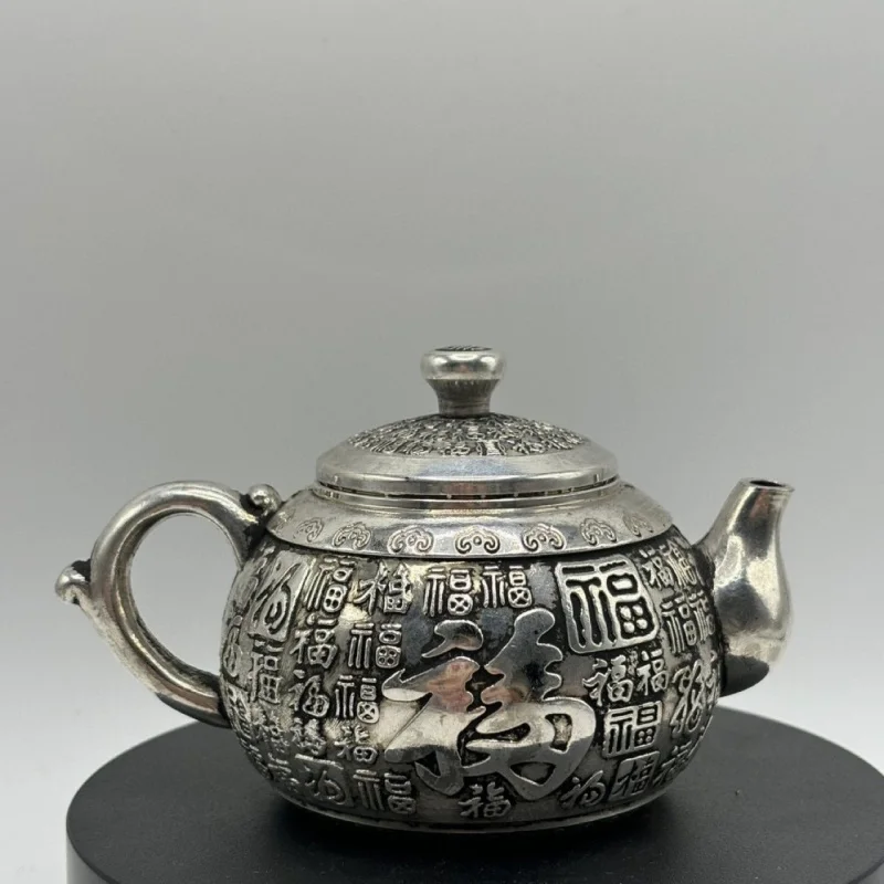 Antique collection, the character "Fu", silver-plated teapot with "Hundred Blessings" design, dragon and phoe