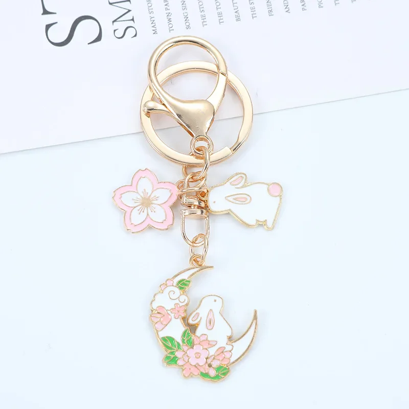 Mode Süße Emaille Kirschblüte Kaninchen Schlüsselbund für Frauen Mädchen Nette Mond Blume Schlüssel Kette Tasche Auto Schlüssel Anhänger Schmuck Geschenk – Detail 4