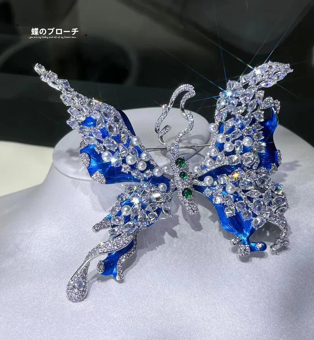 spilla-con-perla-d'acqua-dolce-in-lega-accessorio-blu-ghiaccio-e-neve-gioiello-coordinato-da-34-mm