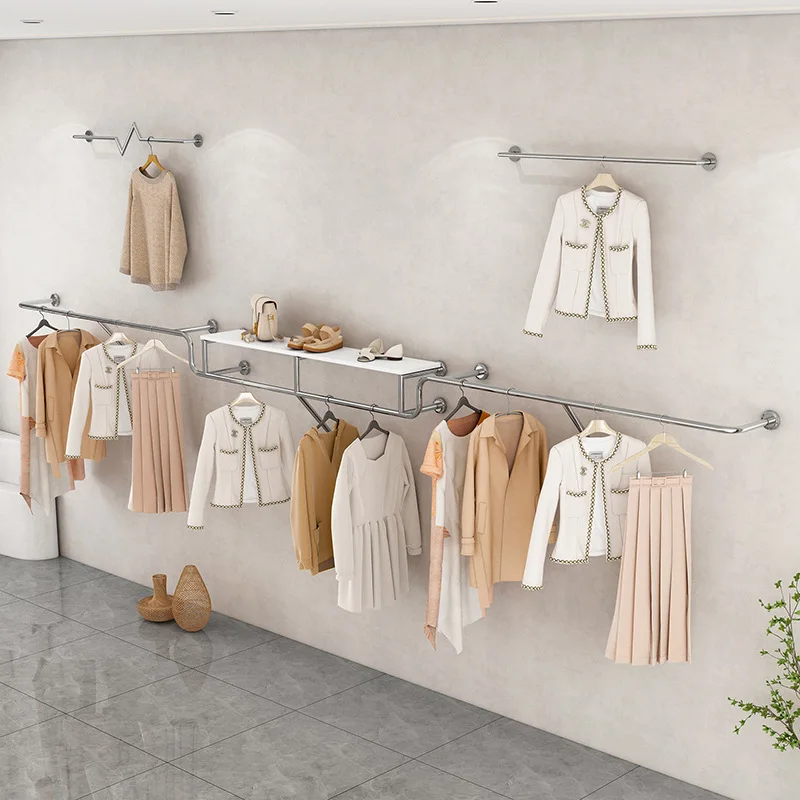 custom.Modern Stainless Steel Laminated Clothing Store Display Rack with Customizable Layout Design Women's Clo