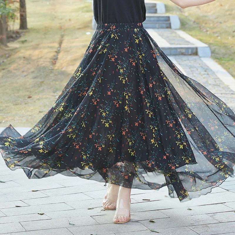 تنورة نصفية كاجوال مطبوعة بالزهور للنساء صيفية بنمط جديد لقضاء عطلة الشاطئ تنورة طويلة متأرجحة كبيرة بطول منتصف الساق لموسم ا...