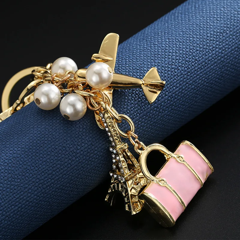 luxury jewelry New alloy pendant fashion travel handbag keychain aircraft tower accessories car bag pendant trending jewelries