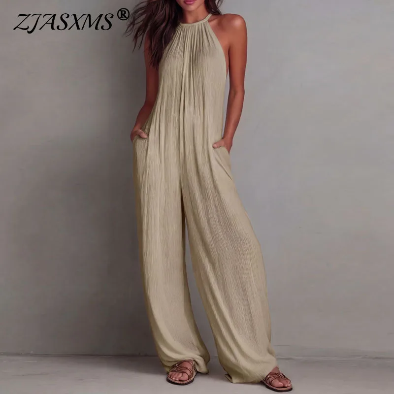 

2026 New Beach Vacation Jumpsuit Women's Halter Sleeveless Textured Overalls Pocket Wide Leg Romper Spring Summer Casual Outfits