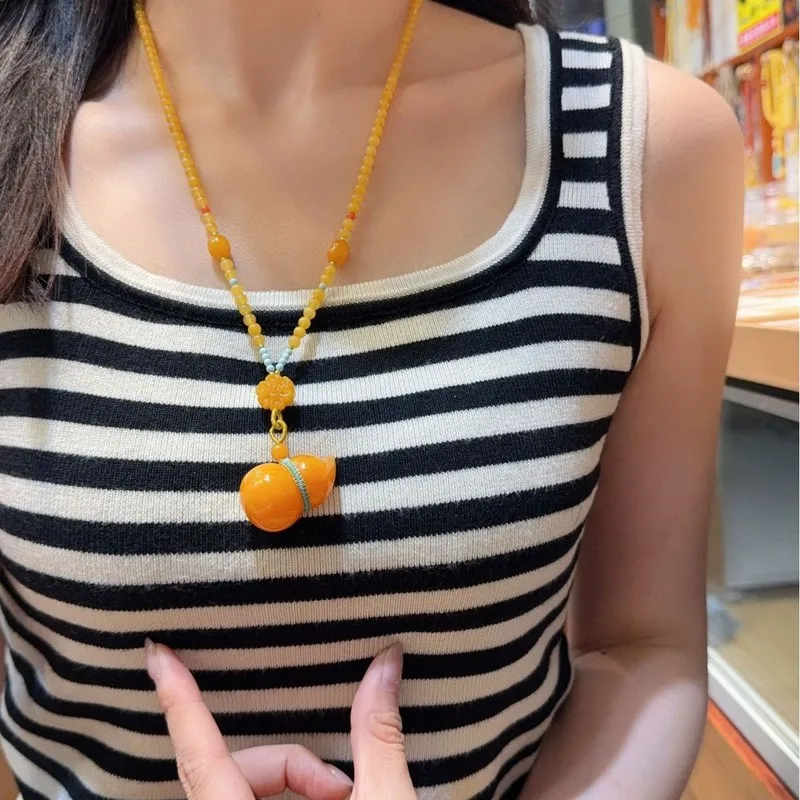 Natural old honey-colored Baltic chicken-yellow and blue amber sweater necklace pendant safety charm