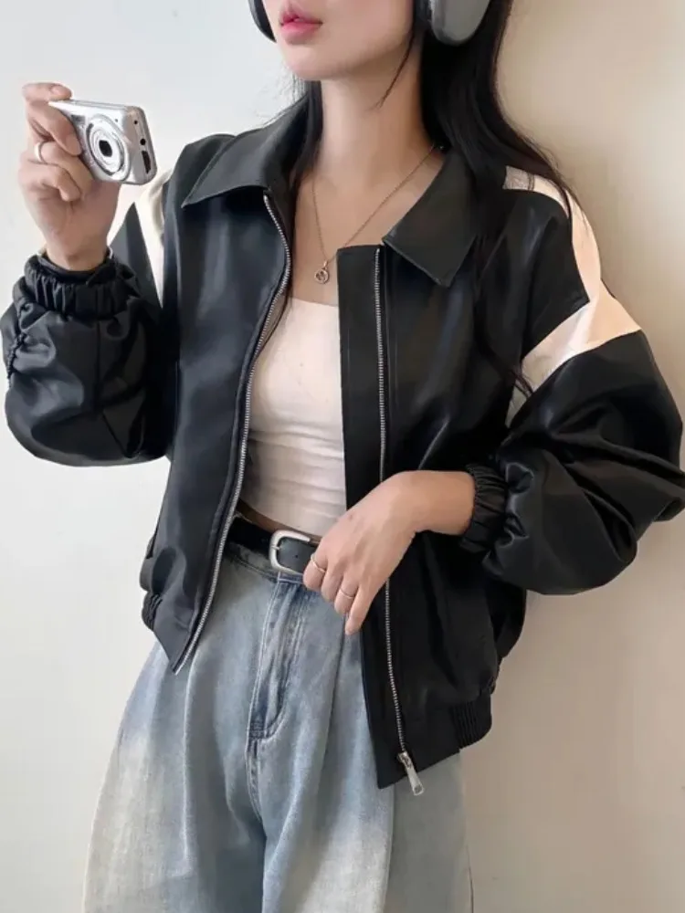 シックな秋のジッパーカラー、オートバイ風レザージャケット、長袖、コントラストカラーの切り替え、レディースファッション