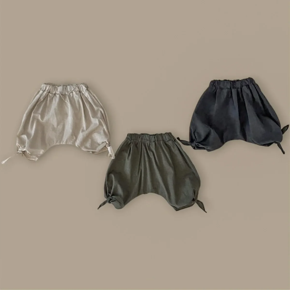 

2025 Summer New Baby Casual Shorts Cotton Infant Boy Solid Breathable Shorts Toddler Girl Loose Bow Pp Shorts Baby Baggy Pants