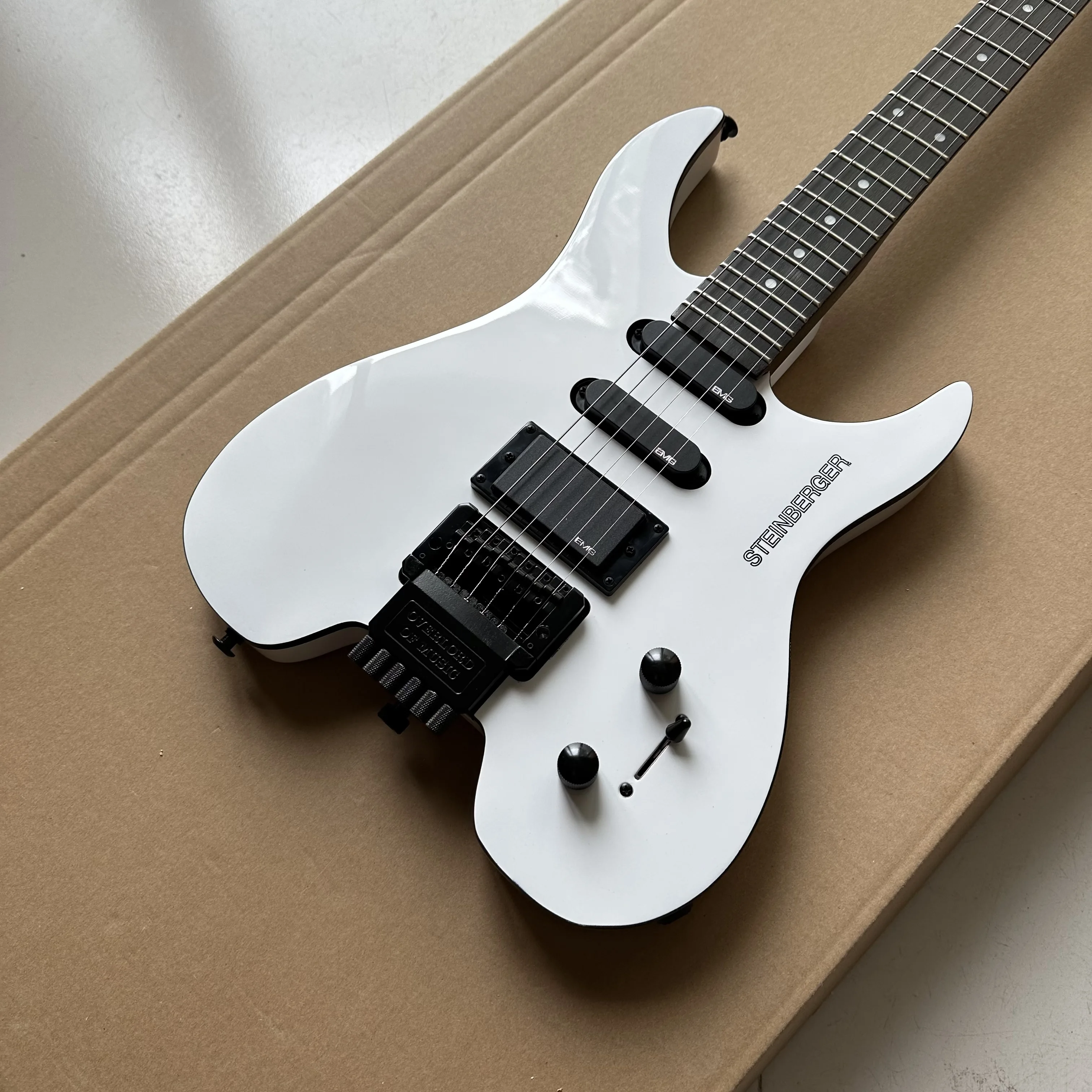 Guitarra eléctrica sin cabeza Steinberg, cuerpo de caoba blanca, diapasón de palisandro