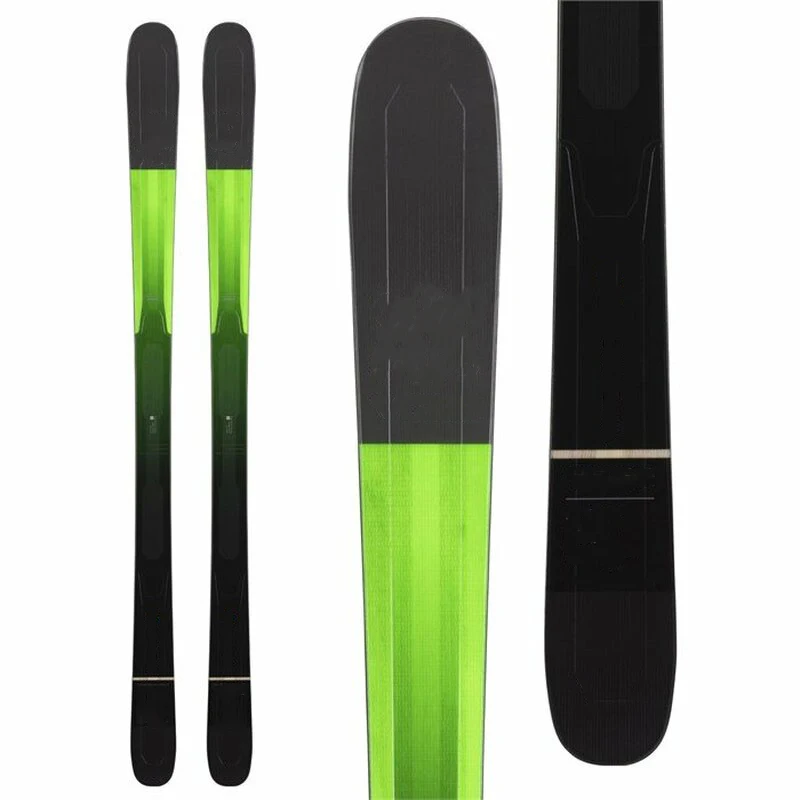 Wide backcounty skis with skin on bottom with step sole sliding  snowshoes