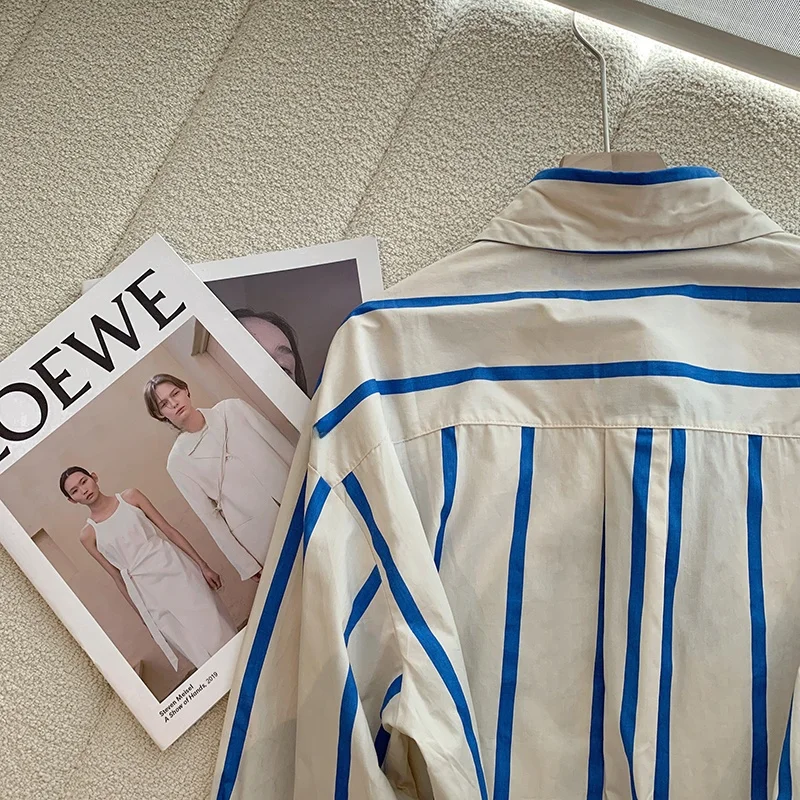 قميص بولو نسائي فضفاض بتصميم كرتوني مطرز ومخطط، مناسب للخريف والشتاء، ذو إحساس عصري ومتعدد الاستخدامات