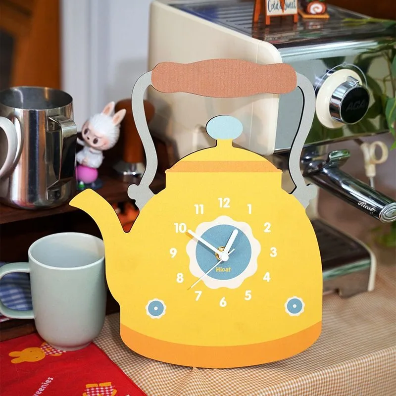 

Creative Cartoon Cream-Style Swinging Kettle Wall Clock – Stylish Silent Quartz Decorative Clock for Kitchen & Living Room