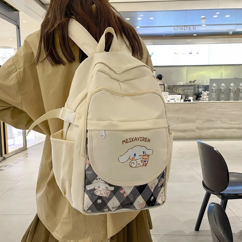 Mochila impermeable Sanrio Cinnamoroll de gran capacidad para niña, Bolsa Escolar Kawaii, bolsa de viaje de Anime para mujer, bolsa de moda para regalo