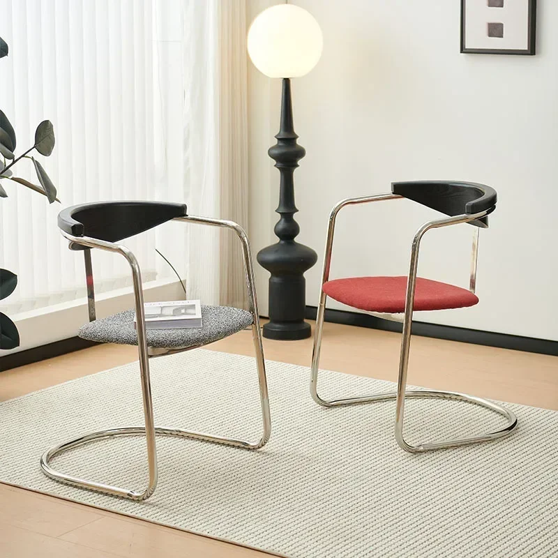 Arc stainless steel solid wood back artistic chair, retro home dining chair