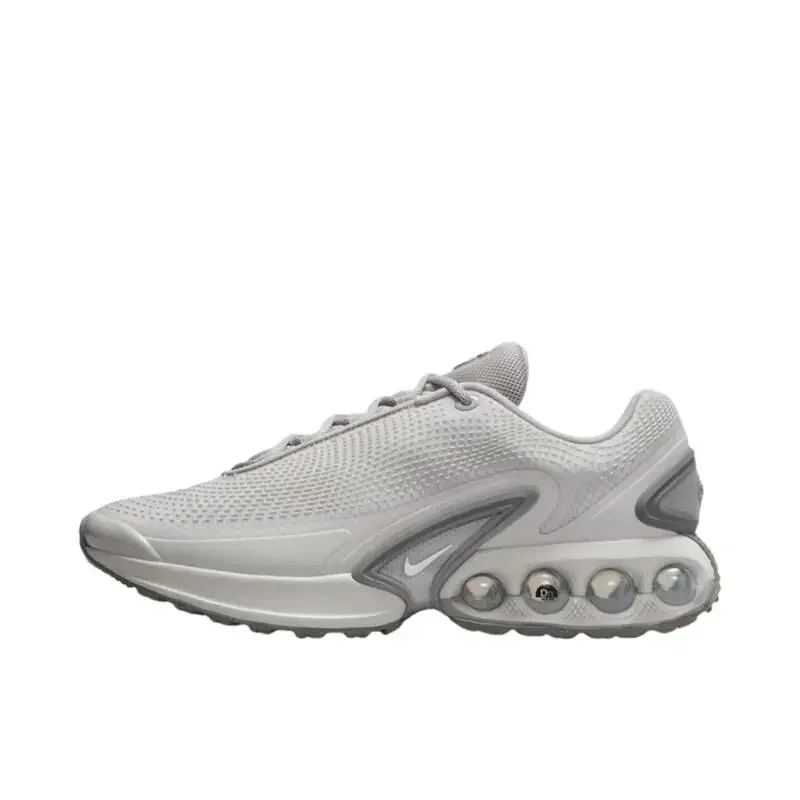 ナイキ エア マックス DN ライト アイアン オレ 快適な滑り止め、耐摩耗性、ロートップ ランニング シューズ、男性と女性の両方、グレー色