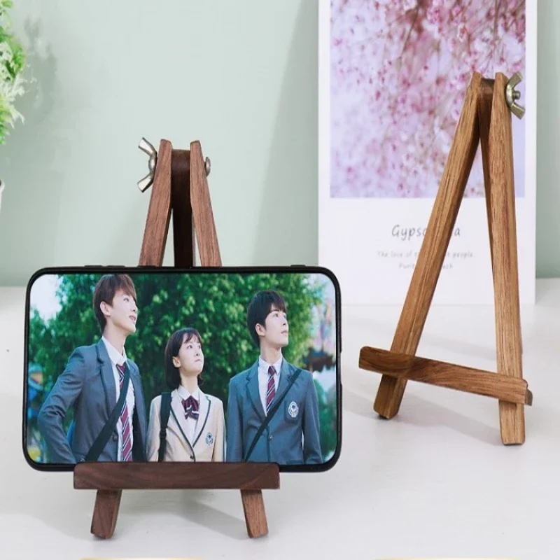 

Black Walnut Phone Holder, Compact and Foldable Triangle Stand, Minimalist Solid Wood Desktop Holder, Sleek Prop, Handy Riser