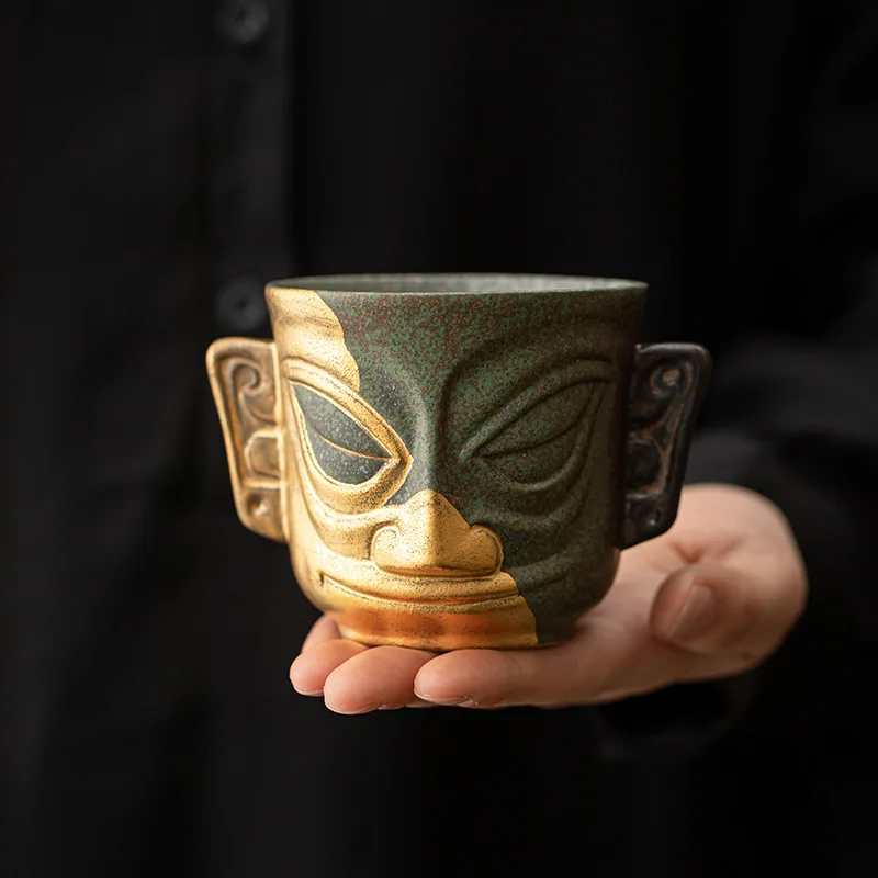 

Chinese Tea Cup Sanxingdui Cultural and Creative Gold Mask Tea Set Tea Cup Personal Home Master Cup Large Tea Cup National Trend