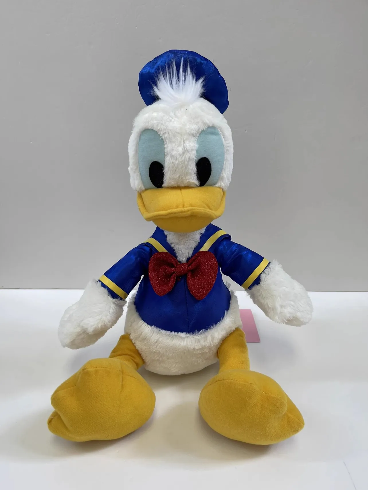 Adorabile cartone animato Donald Duck peluche, regalo di compleanno per bambini