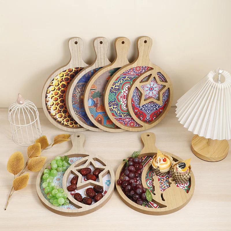 

Wooden handle fruit tray. Round table dried fruit tray decoration. Ethnic festival crafts. A variety of partition fruit trays.