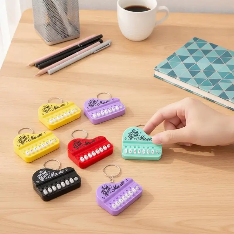 New Mini Portable Piano Keychain Playable Buttons Non-toxic Material Cute Music Pattern Perfect Small Gift for Friends
