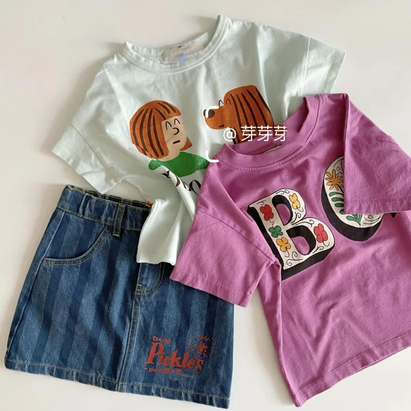 

Новинка 2026 BC: Детские комплекты для девочек с мультяшным принтом (футболка и шорты) и детские поло-рубашки для мальчиков с цветочным принтом.