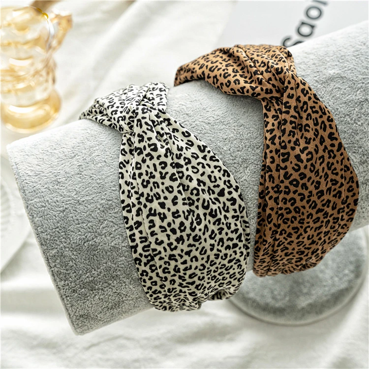 

Korean version of leopard print face hair band female internet celebrity simple wide cross headband hair card jock Sen pressure