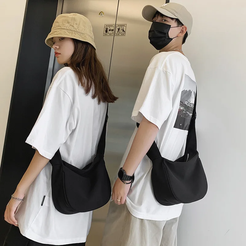 Canvas crossbody bag Japanese ins literary simple shoulder bag for men and women with the same leisure lazy wind small backpack