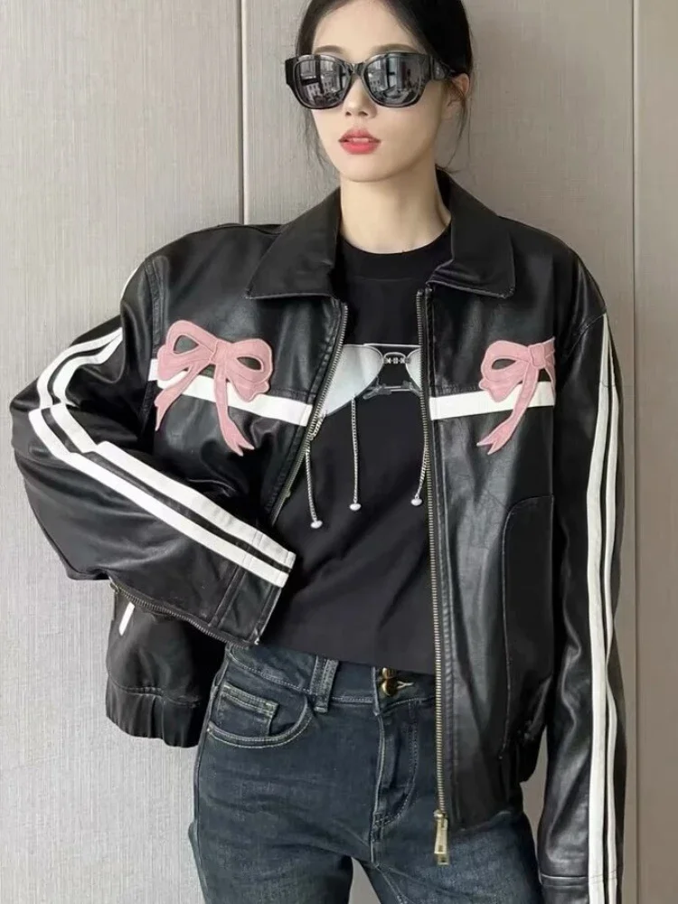 

Ladies' Zipper Jacket in Black Pur Leather with A Pink Bow, A Motorcycle-inspired Leather Jacket, Fashionable Women's Jacket