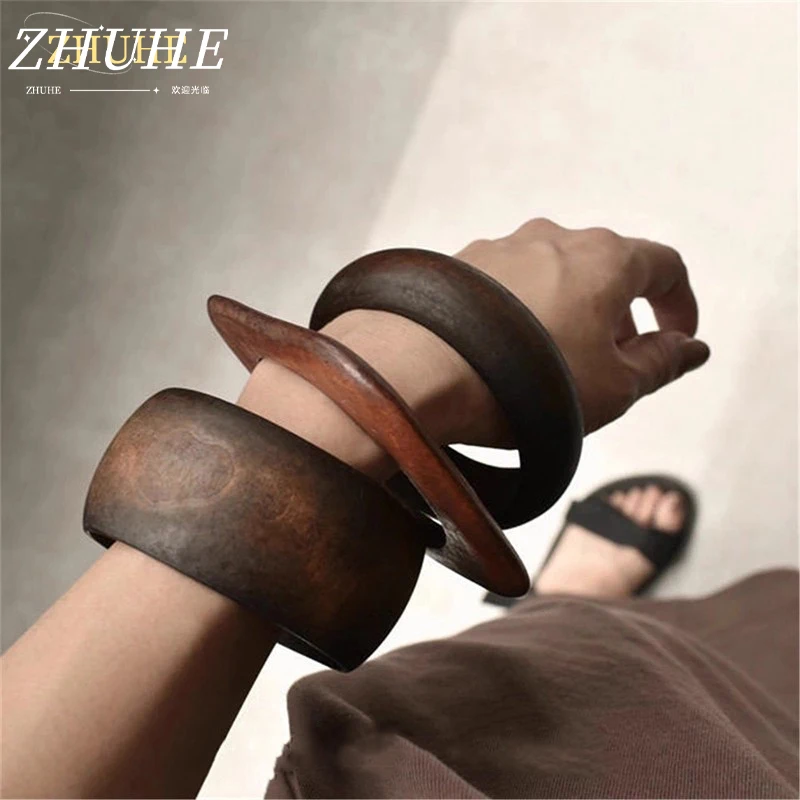 

The Multi-layer Stacked Geometric Light Luxury Wooden Bracelet With A Retro Style Is A Jewelry Accessory For Women