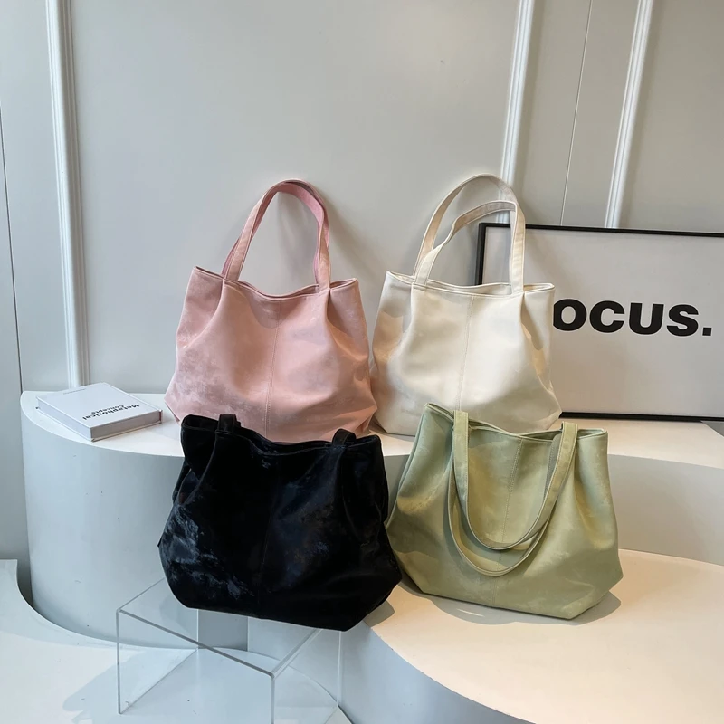 Bolsa de ombro versátil feminina, bolsa monocromática, casual e elegante, alta qualidade, venda quente, nova tendência, 2024