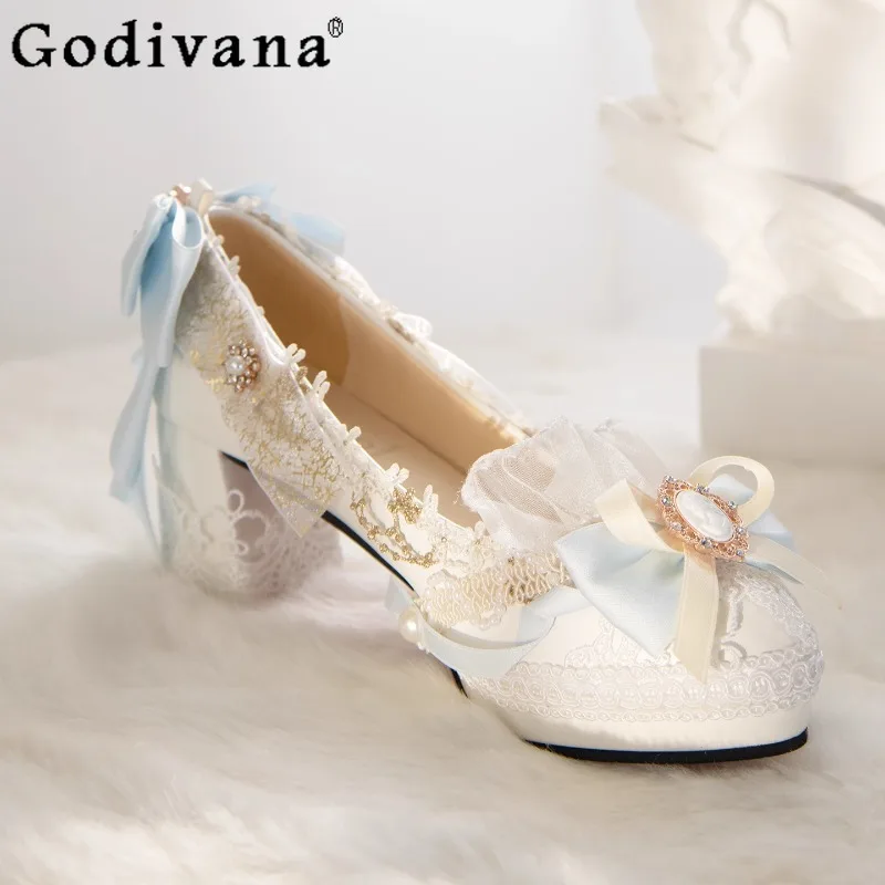 زهرة لوليتا التصميم الأصلي أحذية الفتيات اليدوية القوس جولة رئيس لو أحذية المرأة الصيف الدانتيل عالية الكعب الجلود مضخات