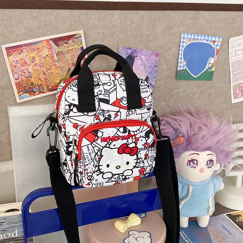 Sanrio-Bolso de hombro de Hello Kitty para mujer, bandolera informal de lona con dibujos animados, tendencia urbana