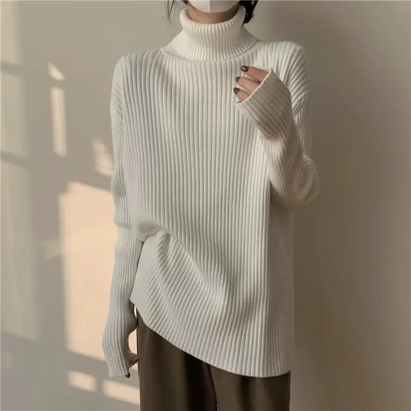 두꺼운 가을과 겨울 여성의 단색 스웨터 느슨한 캐주얼 트렌드 여성의 최고 다재다능하고 세련된