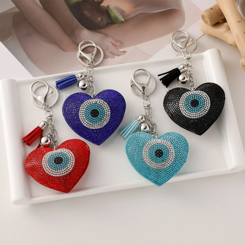European and American car keychains with perforated eyes, fashionable bags, tassel pendants, keychains and small gifts