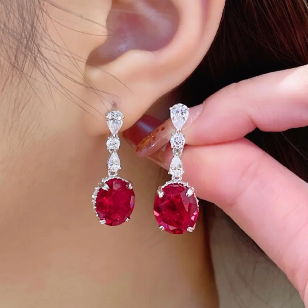 CUMEE. Simple large carat oval cut cultivated synthetic red gemstone earrings. Silver plated gold earrings