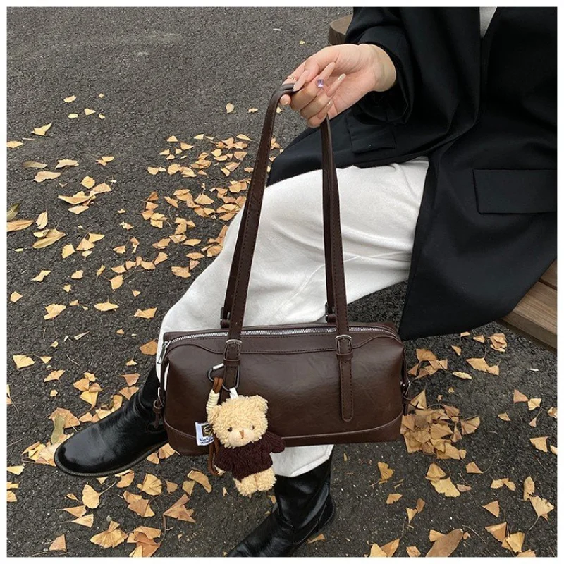 

Classic Women's Satchel In Rich Mahogany Colored Leather With Brass Feet And Durable Construction