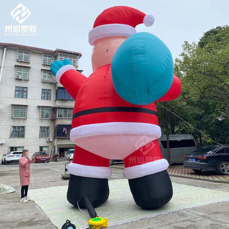 Custom Inflatable Santa Claus with a Backpack Christmas Outdoor Yard Decoration