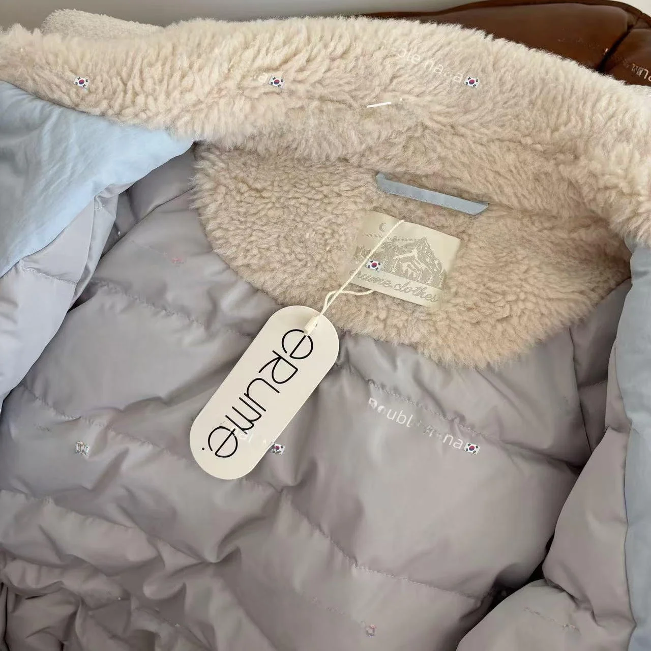 เสื้อแจ็คเก็ตพาร์กาแบบวินเทจสีขาว ยี่ห้อ East Gate Erume รุ่น Casual  บุด้วยใยโพลีเอสเตอร์  แขนยาว  ความยาวปานกลาง  ปิดด้วยซิป